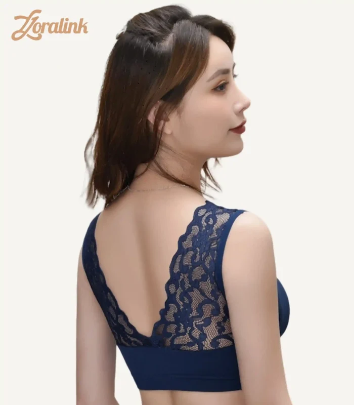 Woman in navy blue lace bra showcasing delicate lace straps and seductive back silhouette - perfect for romantic evenings