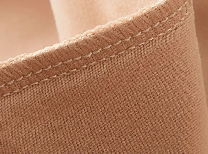 Close - up of women's lingerie fabric, highlighting the quality stitching and material. Represents the meticulous craftsmanship of lingerie manufacturers, emphasizing their ability to offer custom and OEM women's lingerie with high - end finishes.
