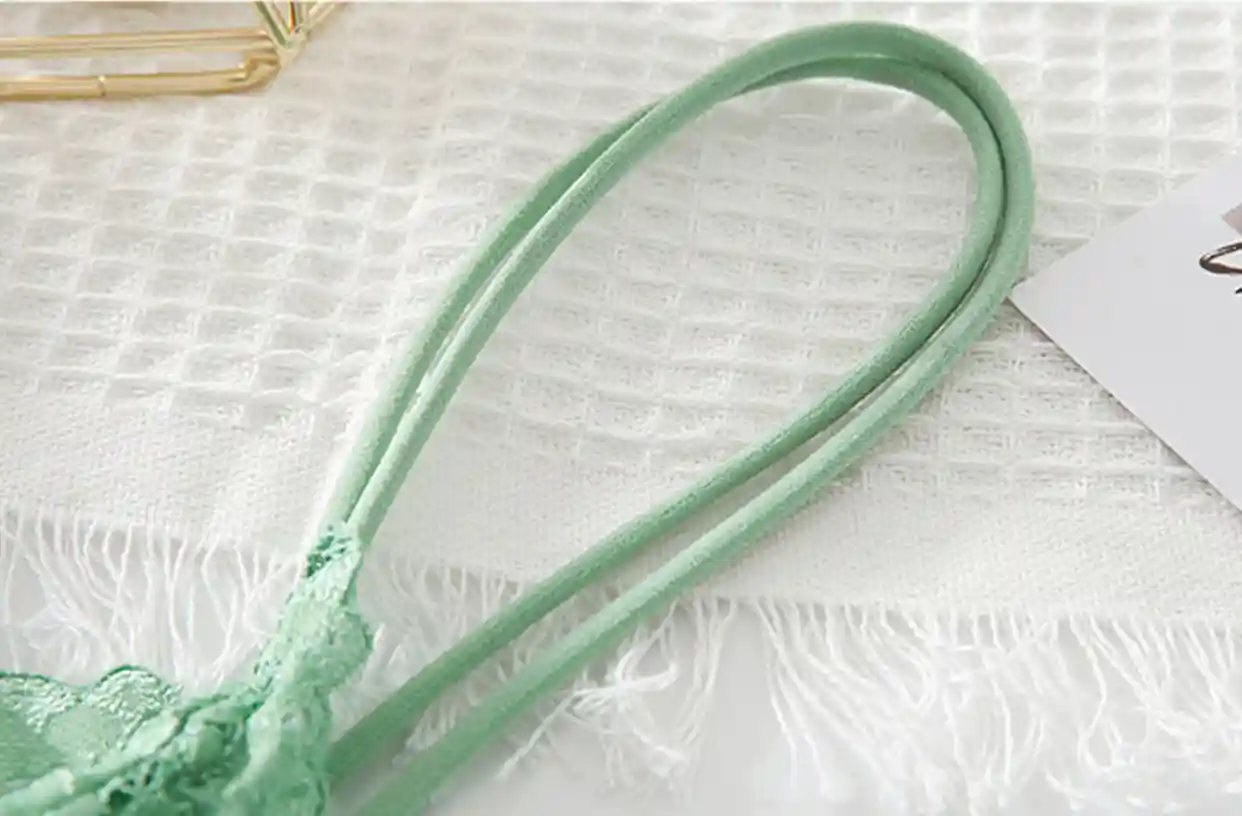Close-up of the adjustable straps on a wireless seamless lace bra, highlighting the delicate design and comfort