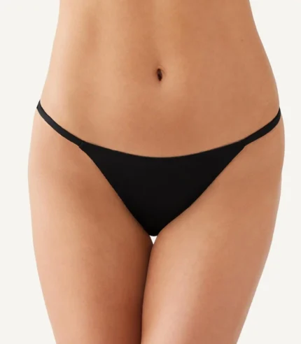 Model demonstrating leak proof comfort of menstrual thong underwear with full body product showcase