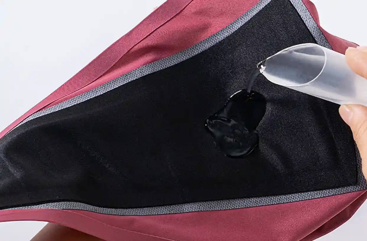 Close-up water pour test demonstrating high absorbency of triple-layer menstrual thong underwear