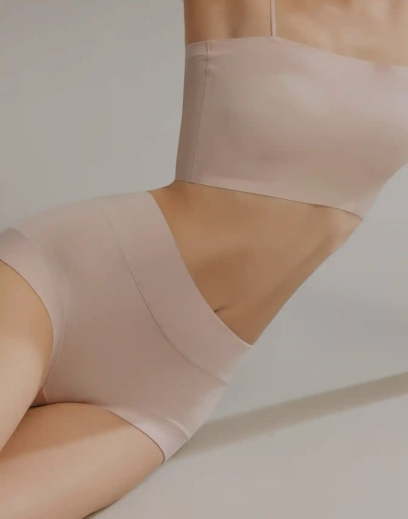 Private Label Lingerie Suppliers03 zoralinkcom wearing seamless light beige lingerie bra and matching underwear highlighting comfort and quality provided by lingerie suppliers offering custom lingerie service low MOQ