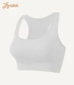 Ribbed Sports Bras Wireless Lightweight Stretchy02 zoralinkcom A white seamless sports bra with a ribbed texture and racerback design crafted from stretchy material for comfort and support