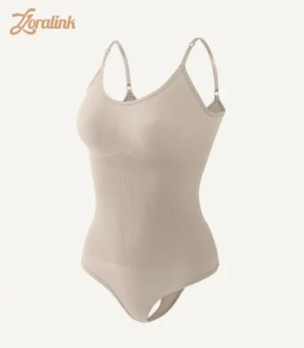 Milk - white seamless bodysuit as shapewear with tummy control function for body shaping, featuring thin shoulder straps and waist texture.