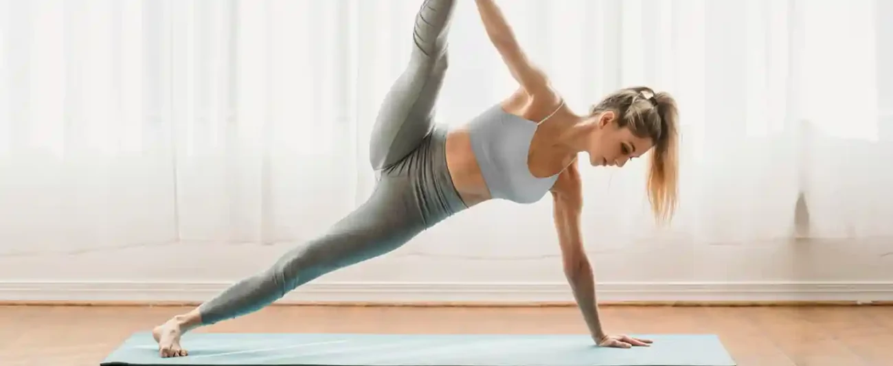 Woman in elegant yoga pose wearing comfortable seamless everyday bras, highlighting the perfect blend of style and support for daily activities