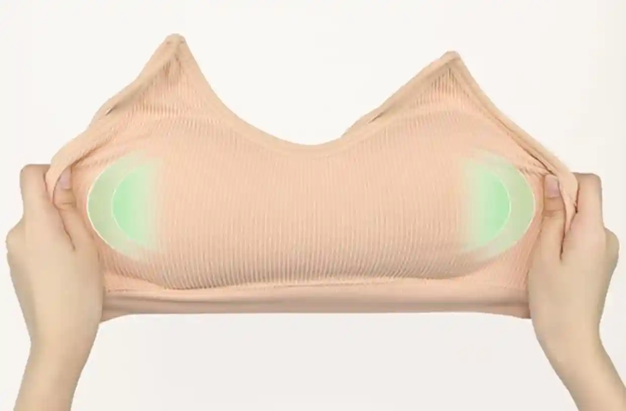 Seamless Everyday Bras Comfortable Breathable Bralette18 zoralinkcom Close up view of an everyday bra being stretched from both sides demonstrating its durable stretch fabric that retains shape after stretching