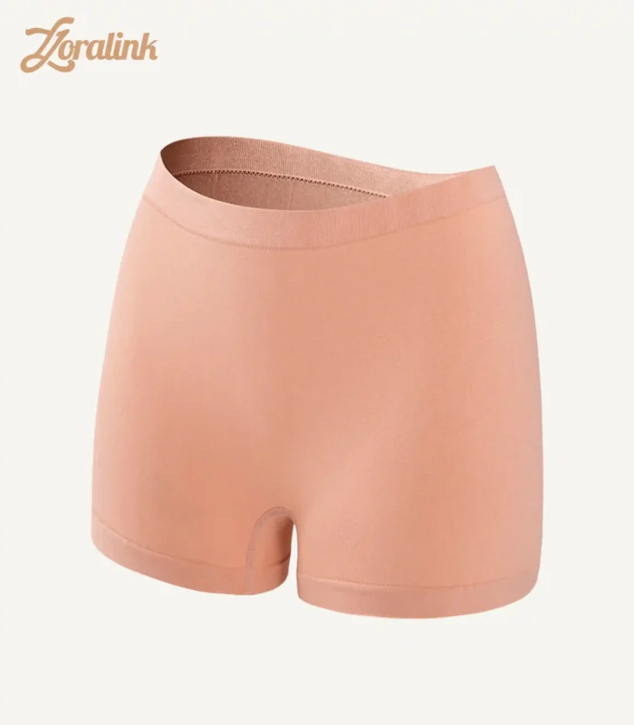 A pair of seamless peach colored panties made from soft and stretchy material ensuring comfort and a smooth fit