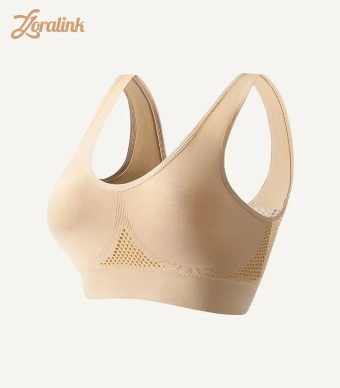 Beige racerback sport bra with breathable mesh for comfortable workouts.