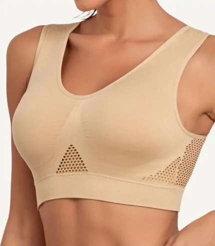 Beige sport bra with breathable mesh sections for comfortable workouts