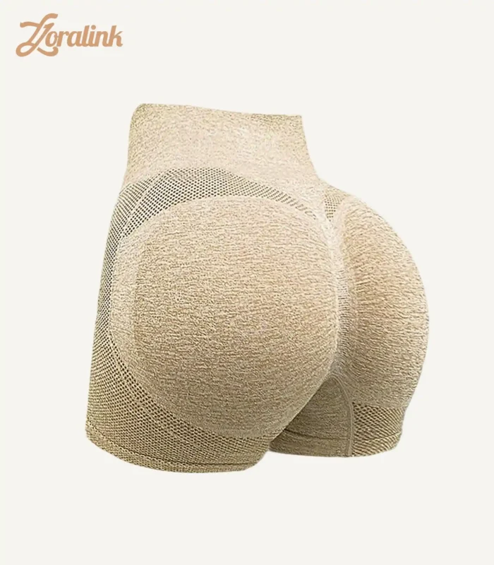 Seamless high - waisted sports underwear shorts in a beige color with a butt - lifting design, made for comfort during workouts.