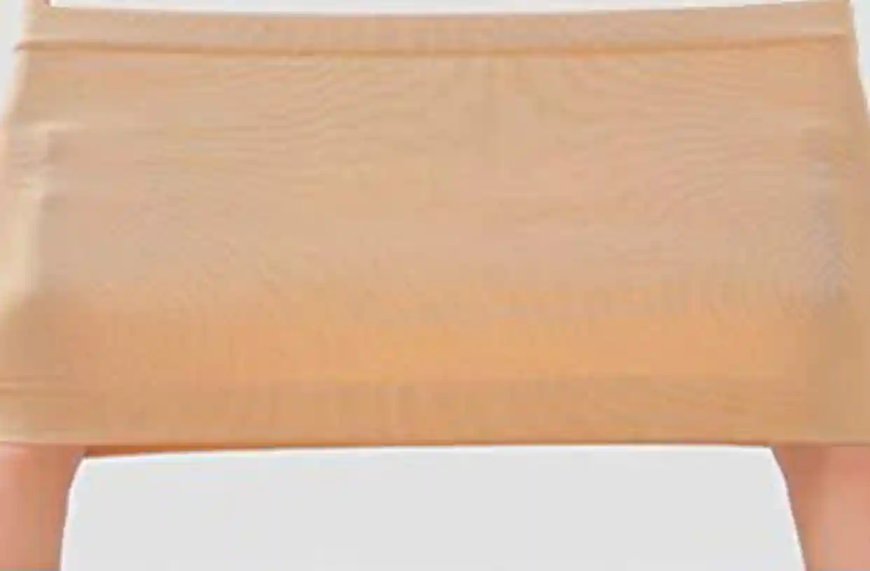 Strapless Bra Tube Top Wireless Seamless Comfortable09 zoralinkcom Close up of a strapless bra showcasing its elastic properties as it is stretched highlighting the seamless design and comfortable support