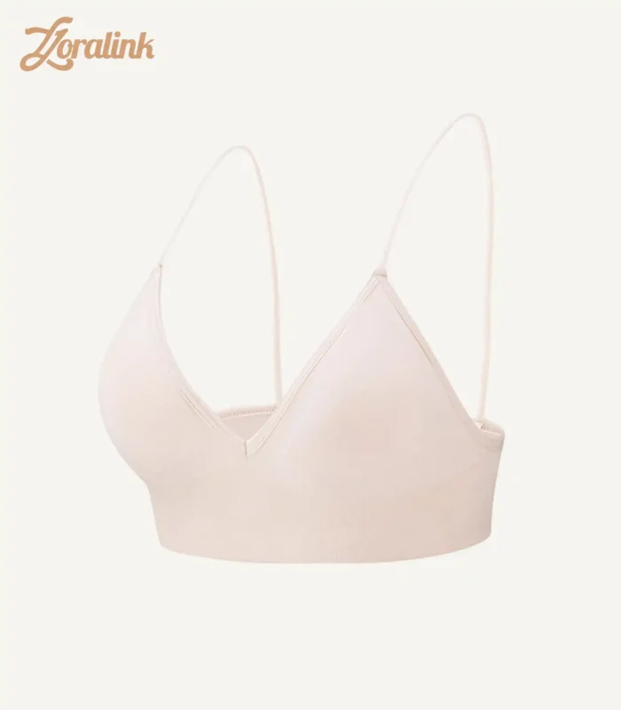 A seamless wireless triangle bra in a light beige color designed for comfort and a smooth fit