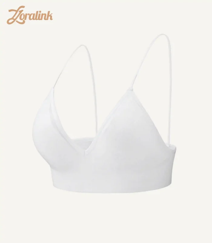 A seamless, wireless white triangle bra designed for comfort and a minimalist aesthetic.