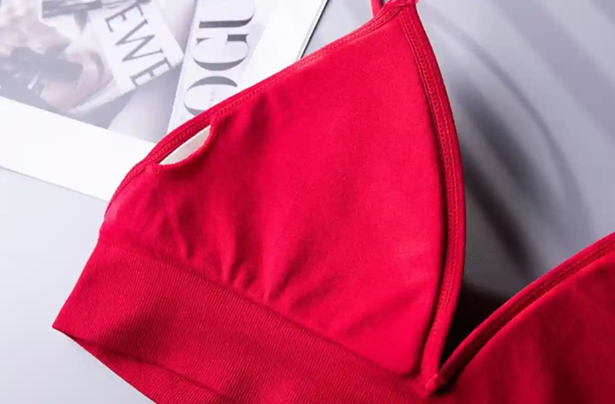 Triangle Bra Seamless Wireless Comfort Style13 zoralinkcom Close up of a vibrant red seamless triangle bra highlighting its smooth fabric and comfortable design